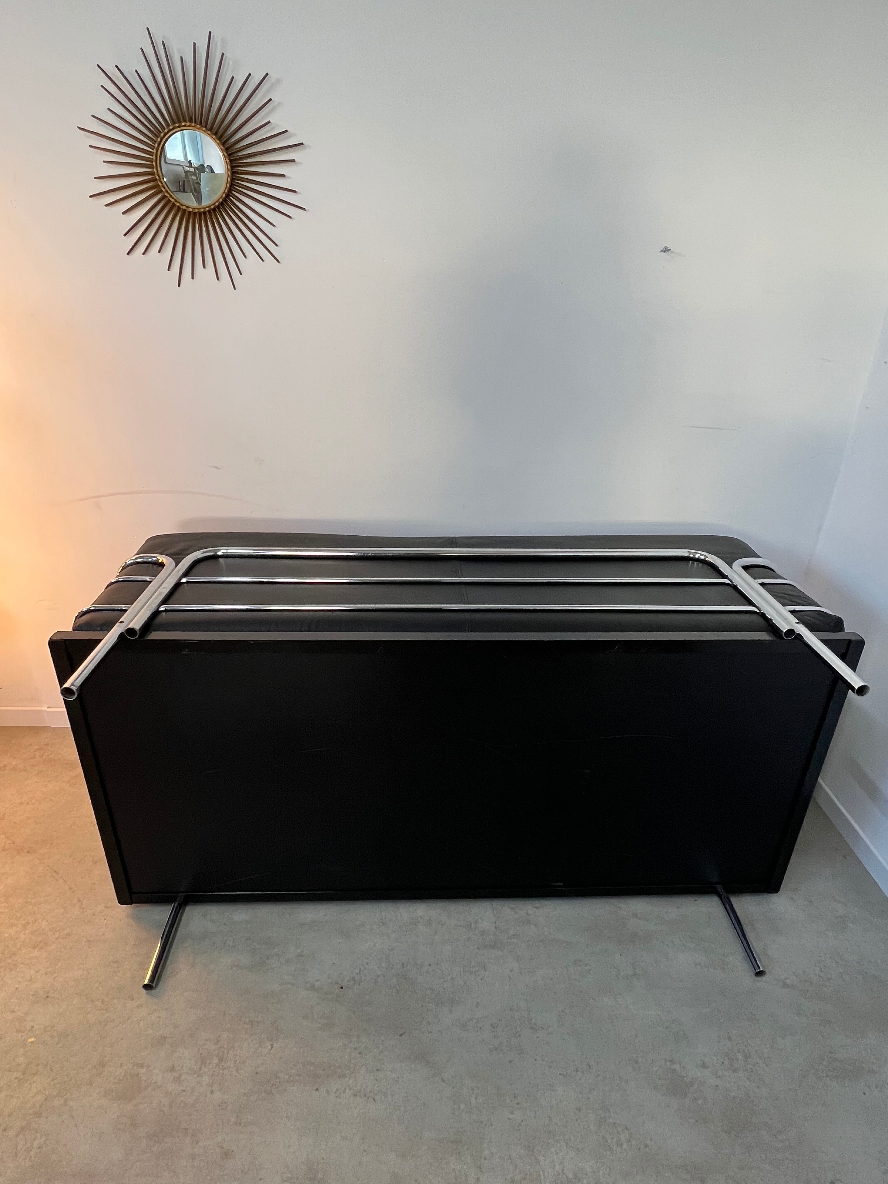 Old vintage leather and tubular metal sofa, design 70s