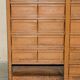 Industrial metal chest of drawers with 30 drawers.