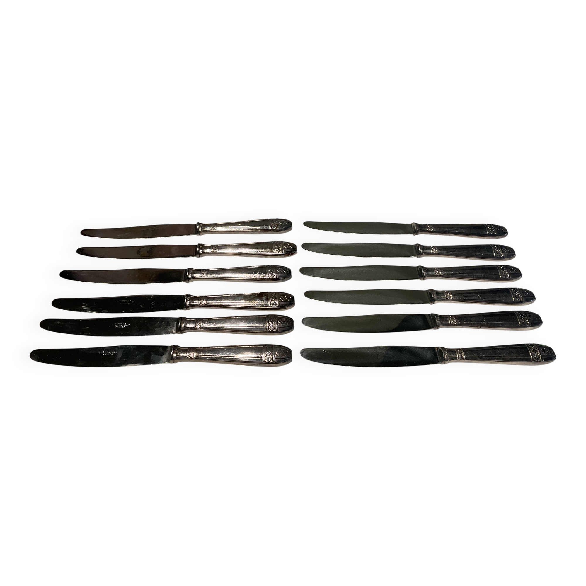 12 couteaux . métal argenté . art deco