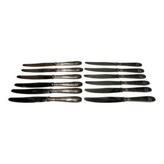 12 couteaux . métal argenté . art deco