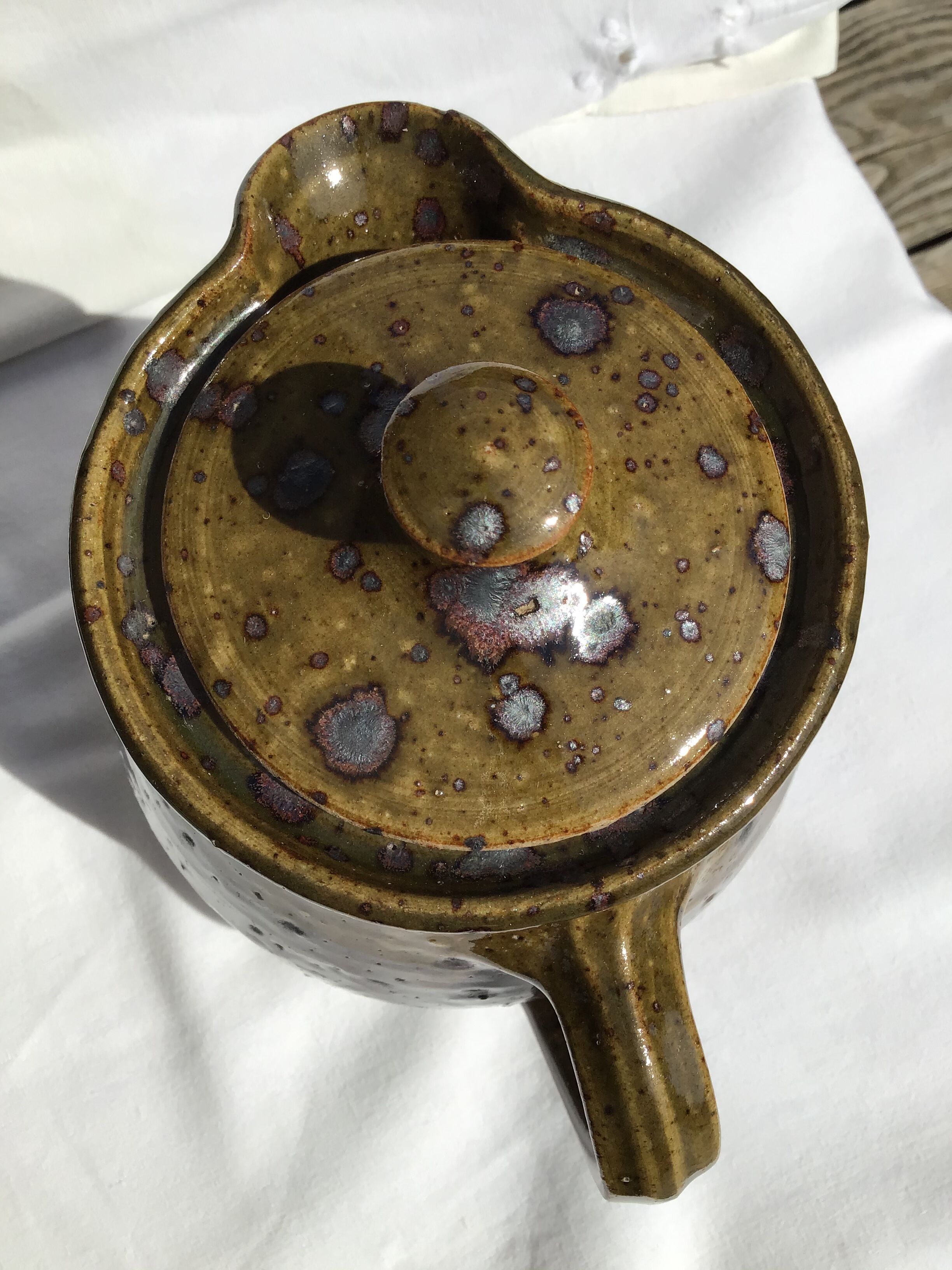 Signed olive green pyrity sandstone tea