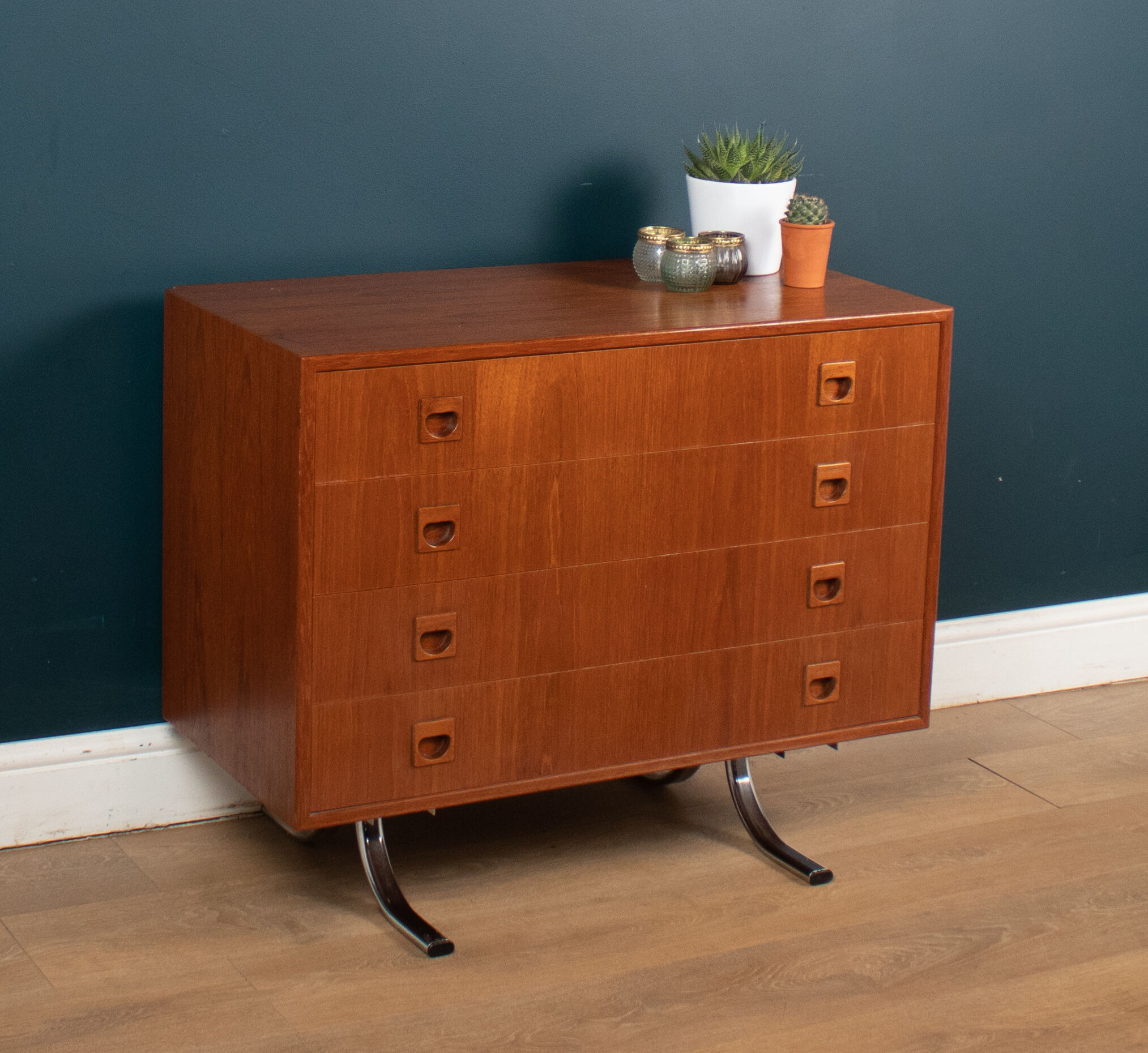 Retro teak 1960s danish chest of drawers on metal legs