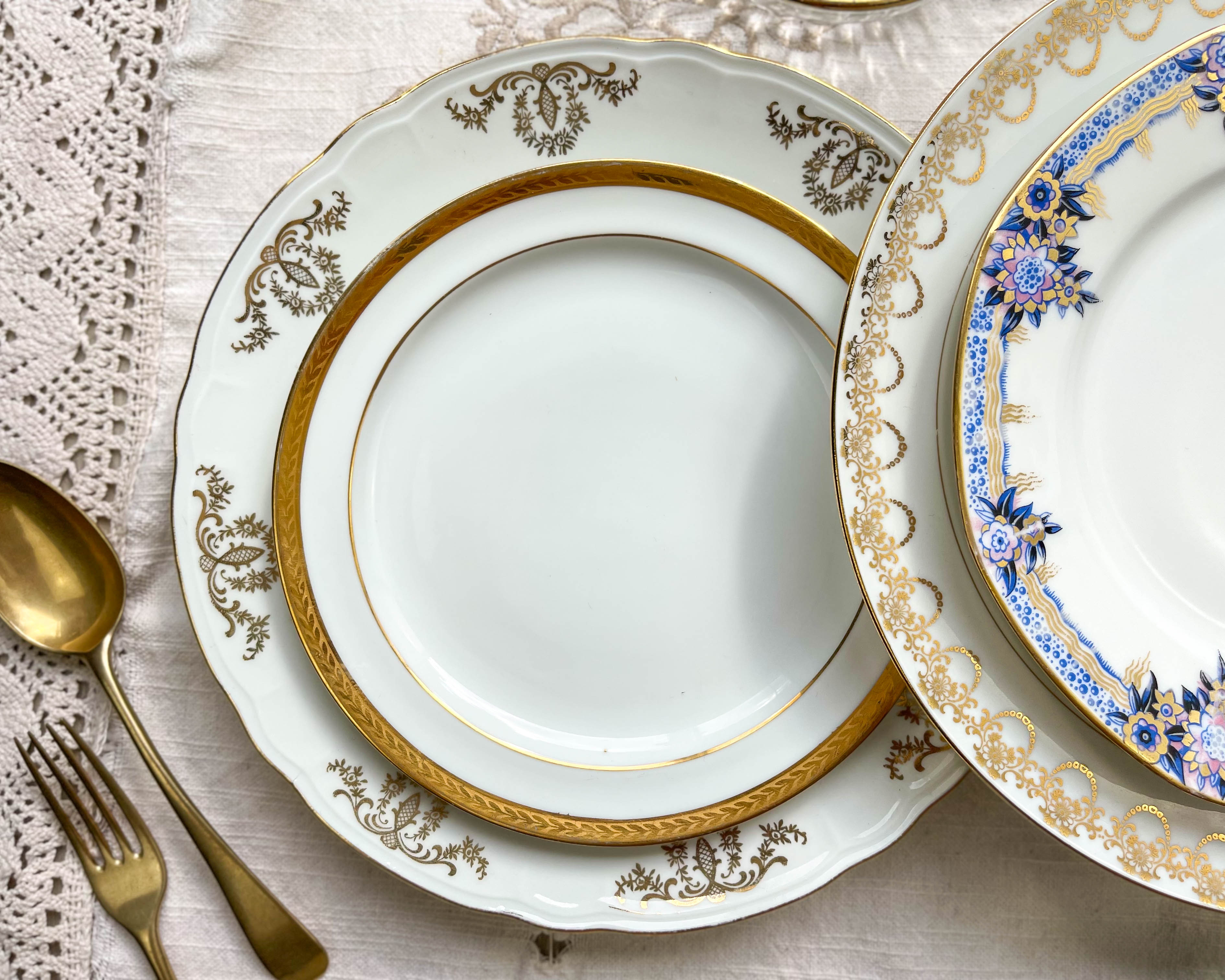12 Mismatched porcelain plates