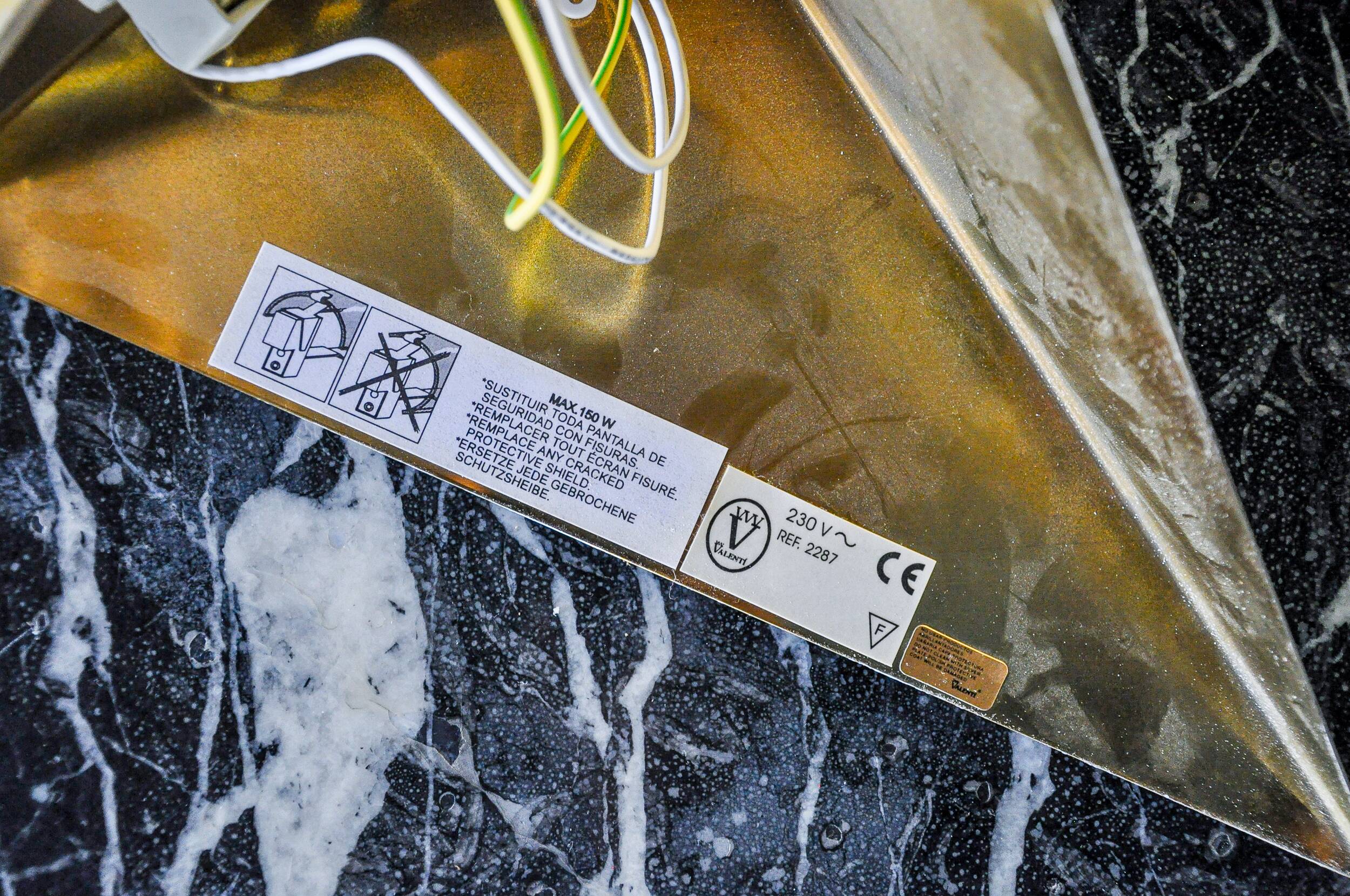 Pair of “Soleil” wall lights by Italo Valenti, brass and silver, Spain 1970