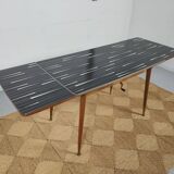 Adjustable vintage table with formica extension cords