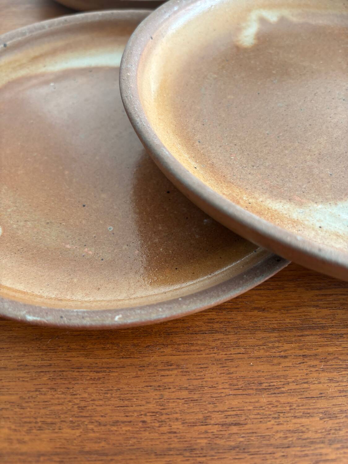 Lot of vintage 1970s beige stoneware dessert plates, handmade.