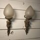 Pair of torch wall lights in Louis XVI style in 19th-century bronze.