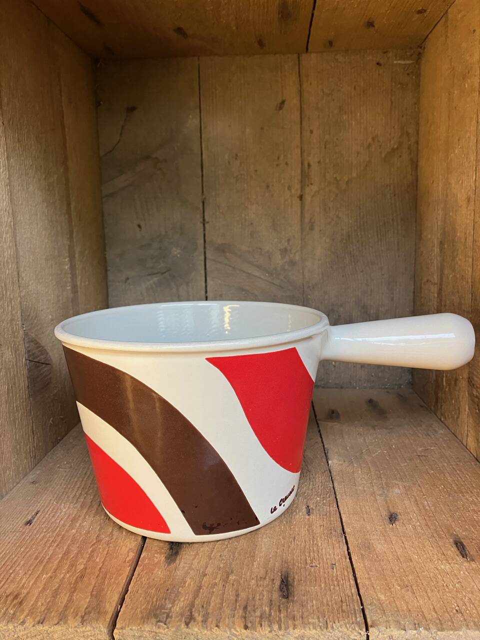 Vintage Le Creuset enameled cast iron fondue pot from the 1970s