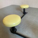 2 black and yellow metal wall coat racks