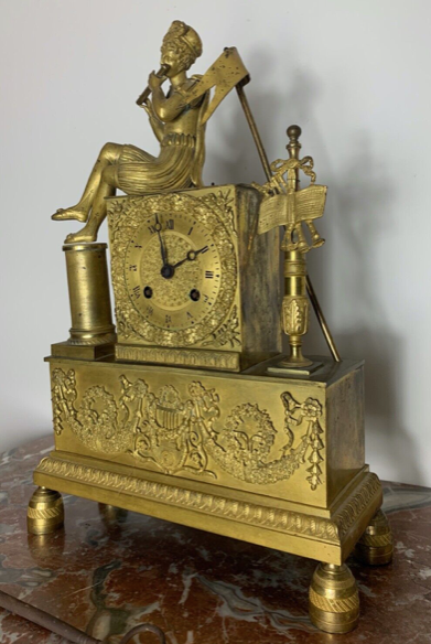 Period clock restoration XIXth in gilded bronze