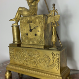 Period clock restoration XIXth in gilded bronze