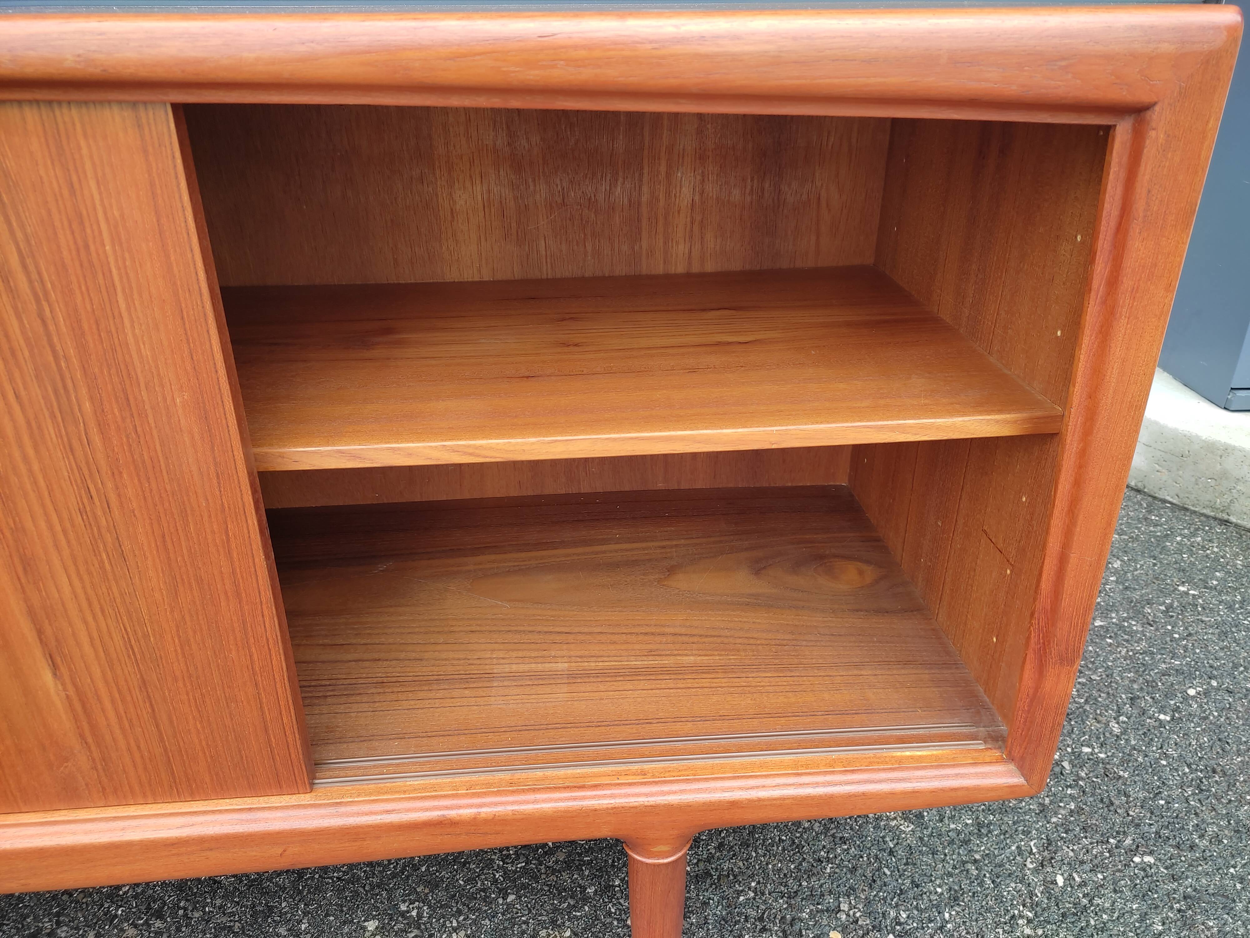 Scandinavian teak row by Axel Christensen for ACO Mobler