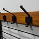 Coatrack mural vintage en teck et métal