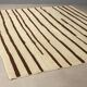 Handmade Asian wool rug with large knots 108 x 100 in