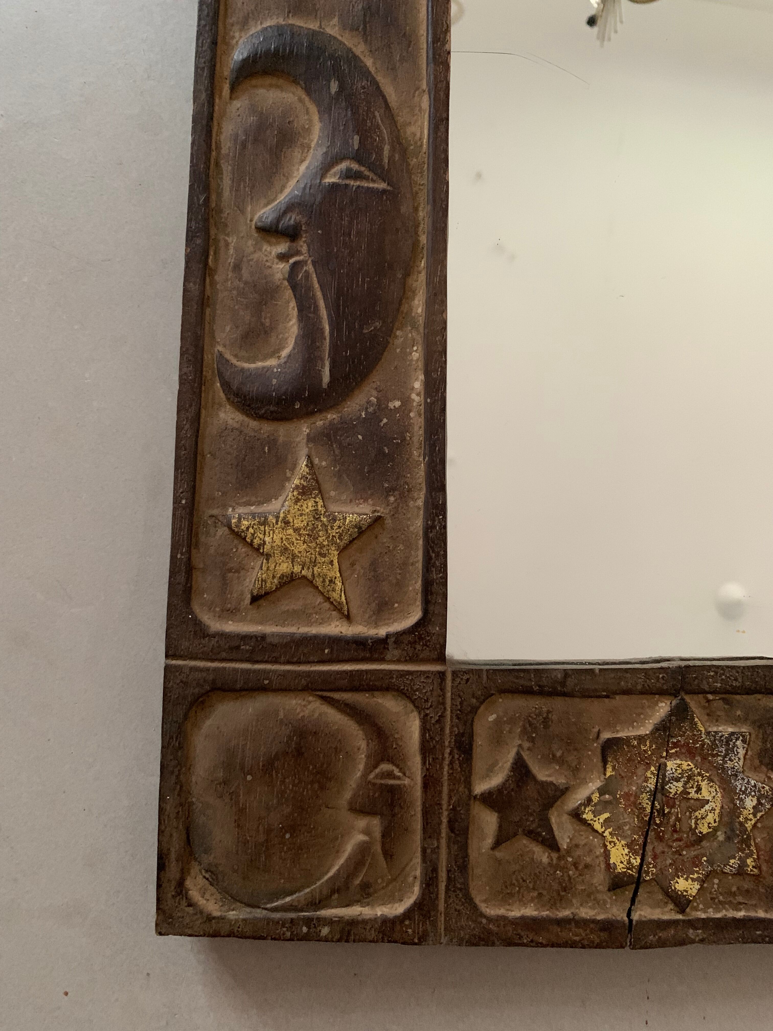 Antique carved wooden mirror