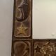 Miroir en bois sculpté ancien