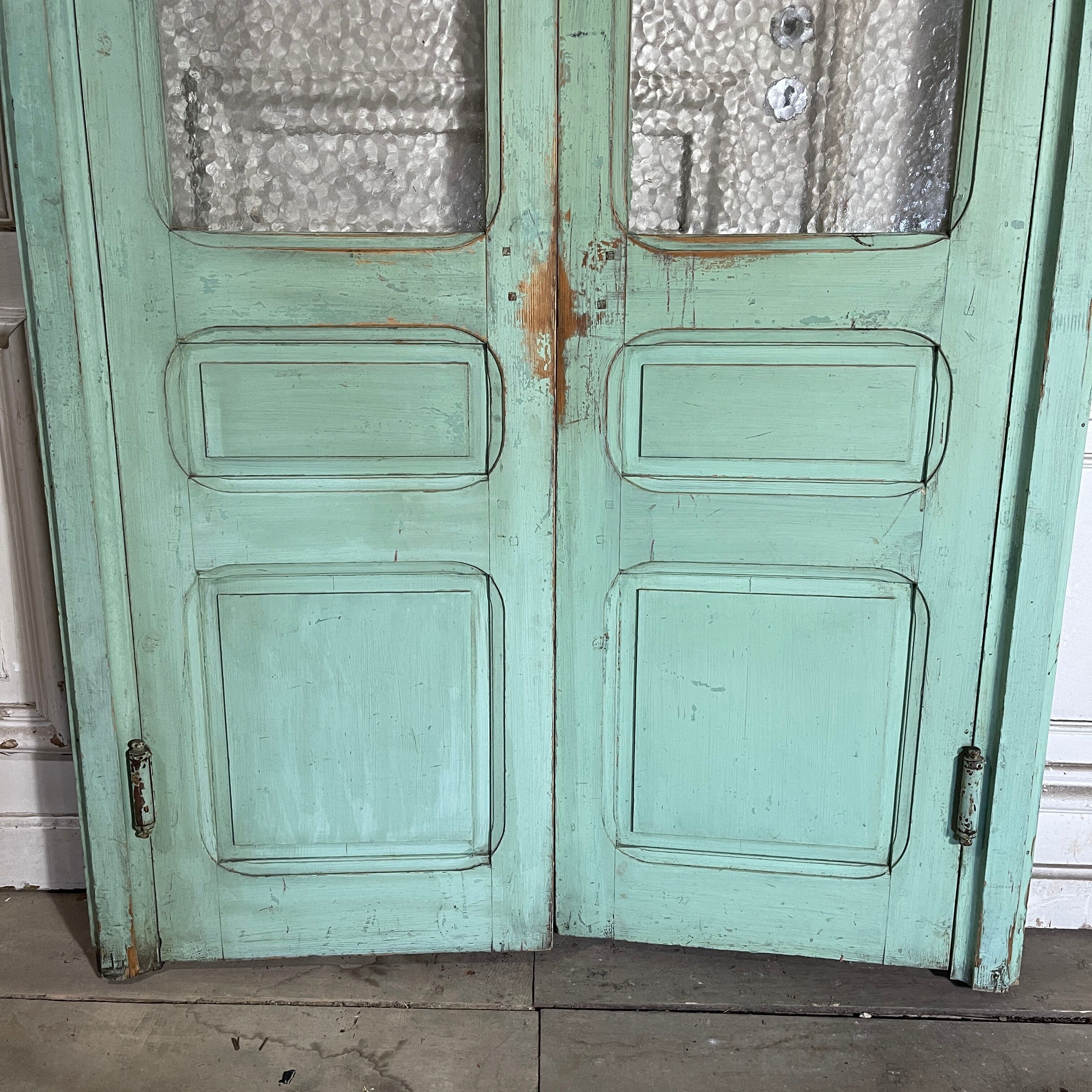 Old pair of saloon type glass doors