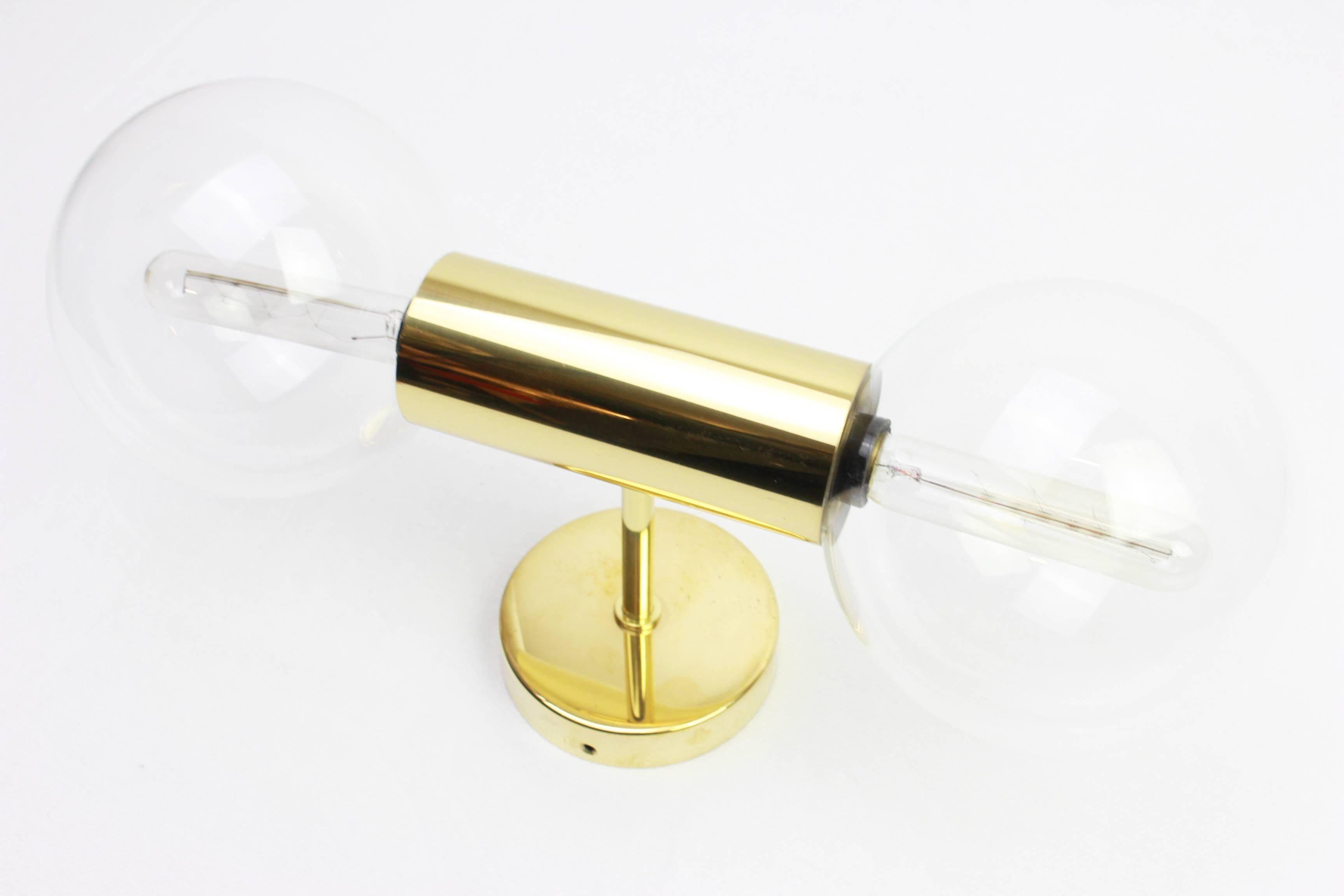 Pair of mid-century wall sconces designed by Motoko Ishii for Staff, Germany, 1970s.