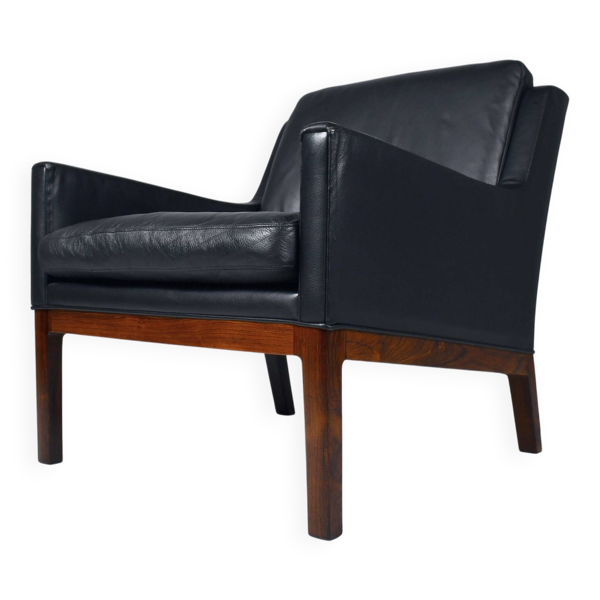 Fauteuil en cuir et en palissandre par Kai Lyngfeldt-Larsen. Danemark