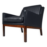 Fauteuil en cuir et en palissandre par Kai Lyngfeldt-Larsen. Danemark