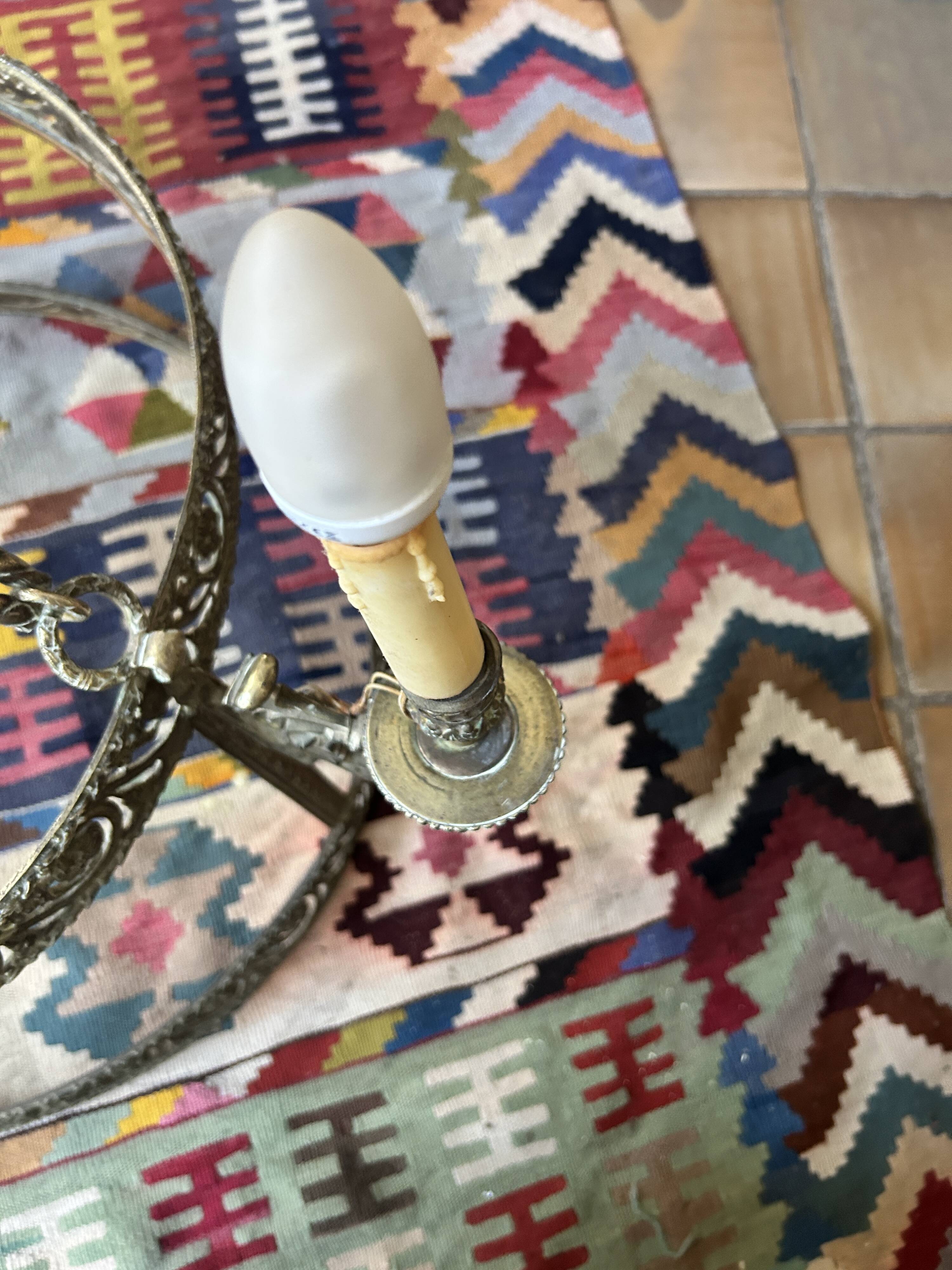 Brass chandelier from the early 20th century.