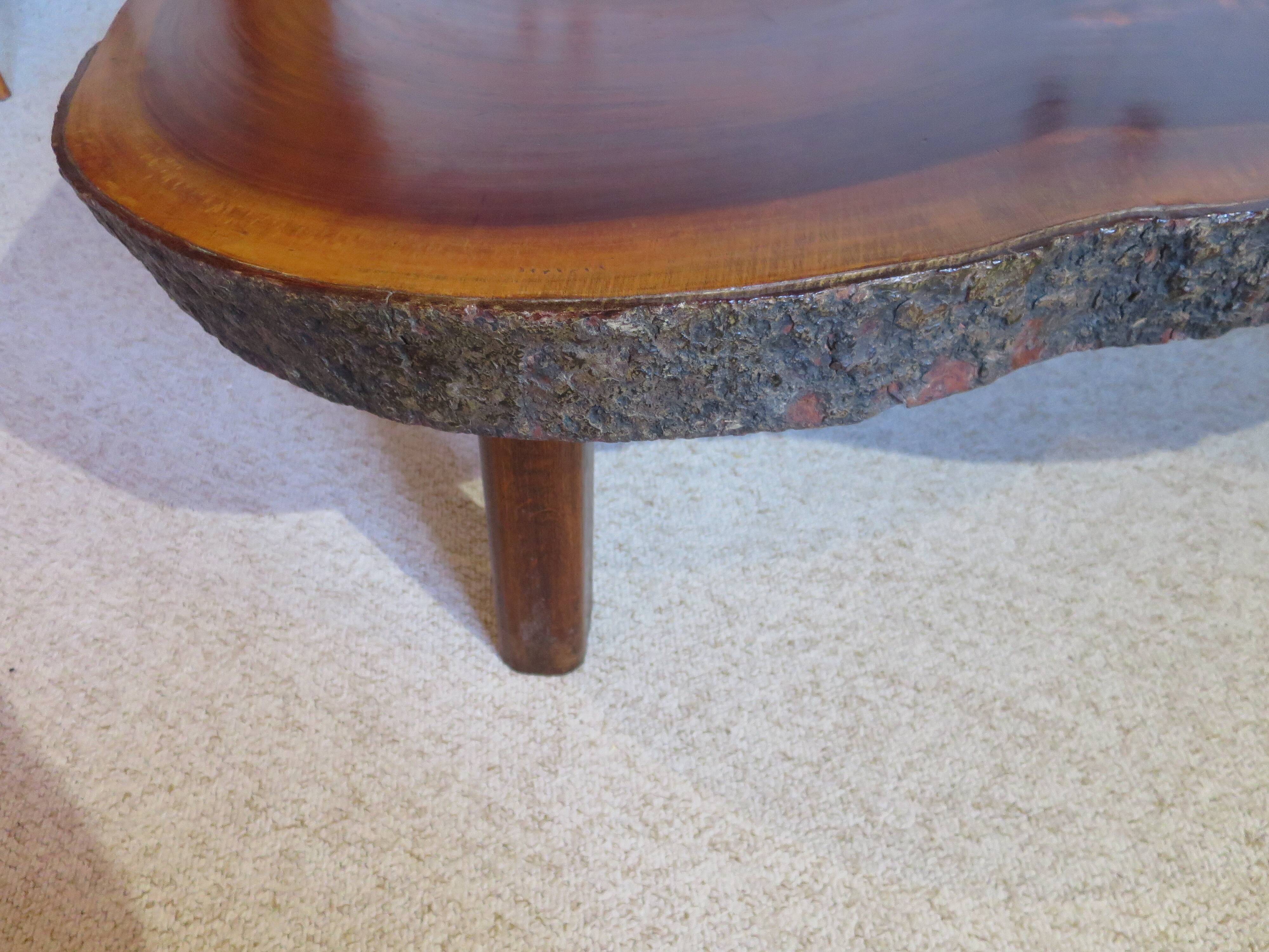 Tripod coffee table - solid okoumé wood - organic shape - brutalist style