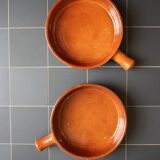 Two enameled terracotta fondue pots