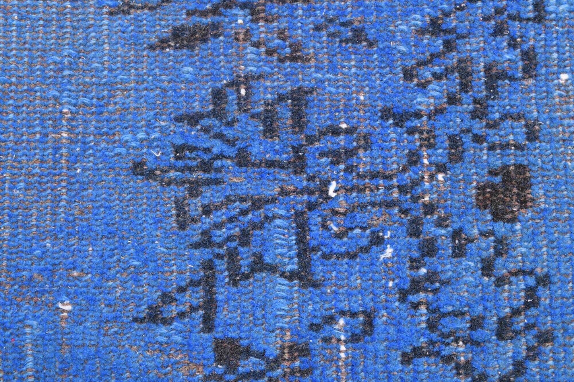 Vintage blue and black Turkish rug with traditional design, 163 × 268 cm