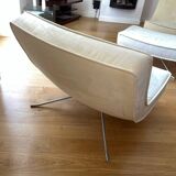 Two armchairs and a pop footstool from Roset