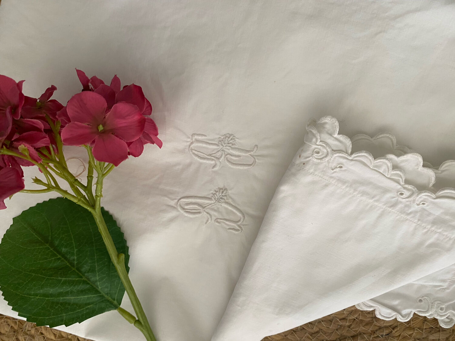 White cotton pillowcase with monogram BC.