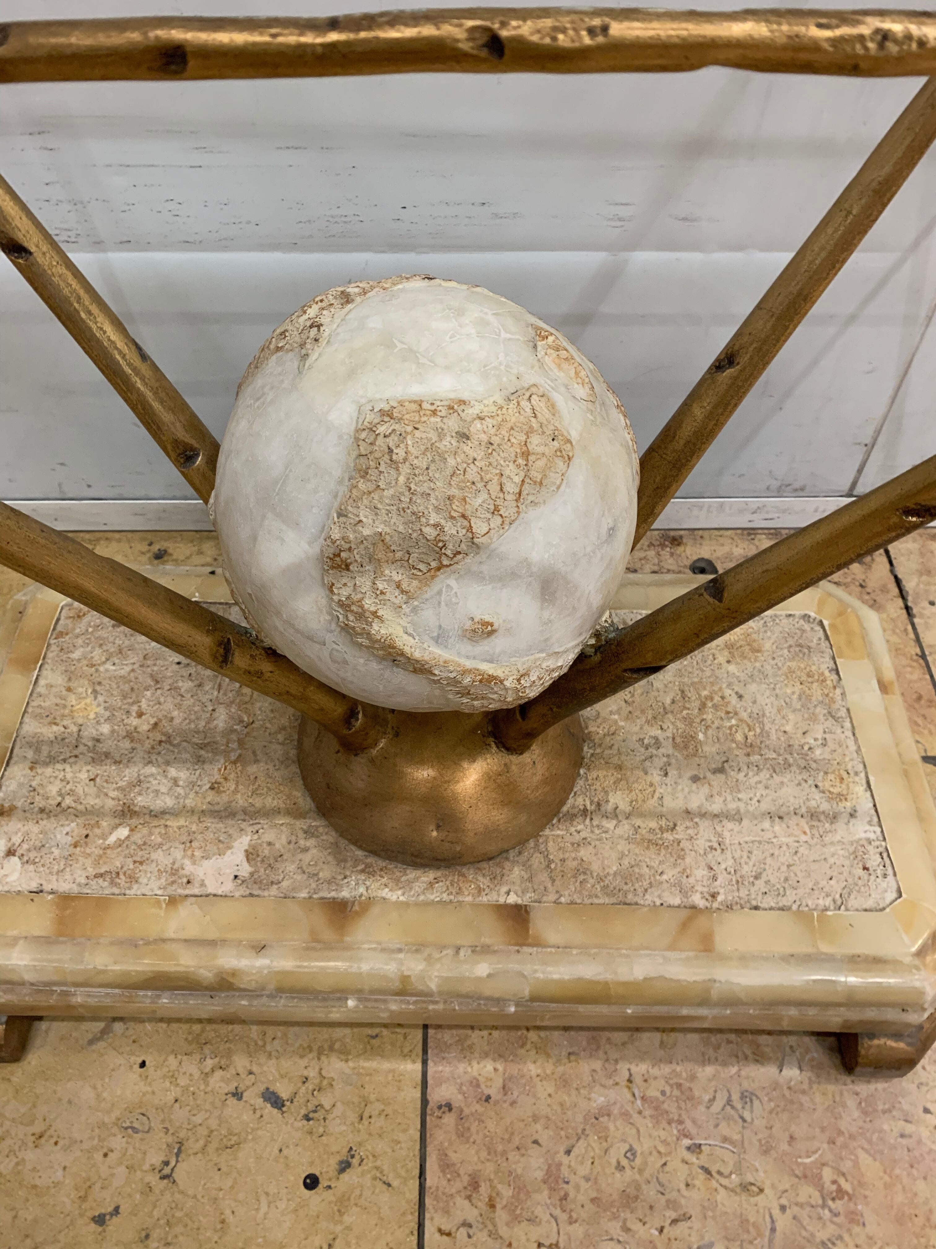 Travertine console from Fournier Paris over glass