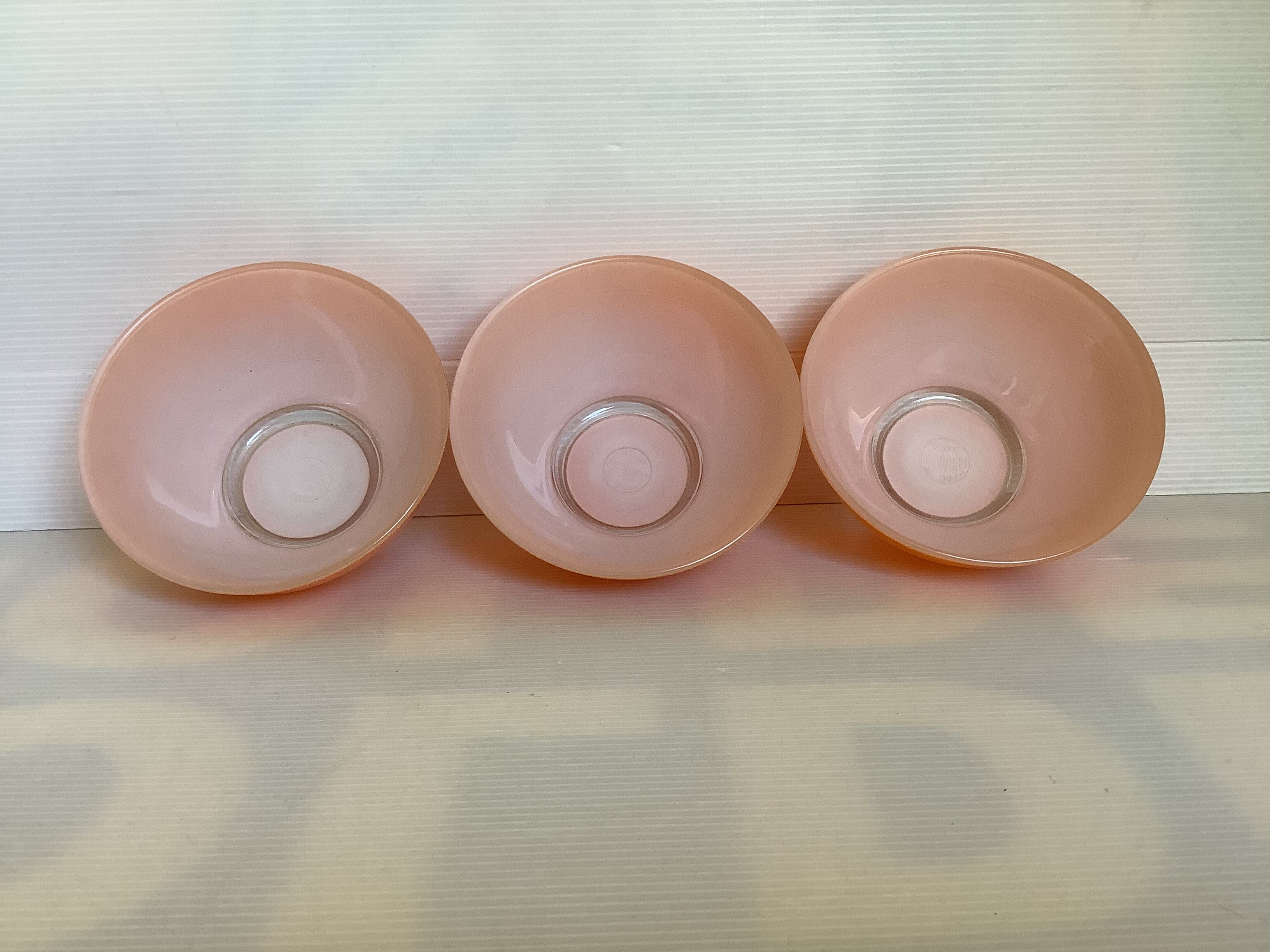 Five old orange duralex bowls