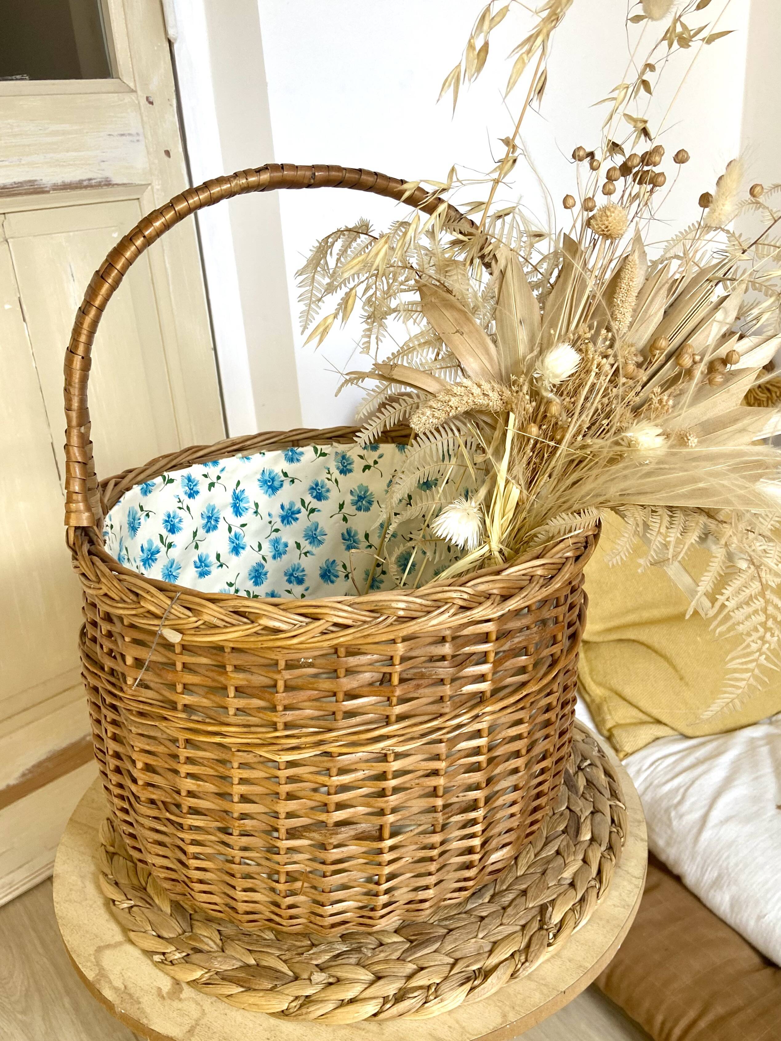 Wicker basket with waxed canvas blue flowers