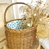 Wicker basket with waxed canvas blue flowers