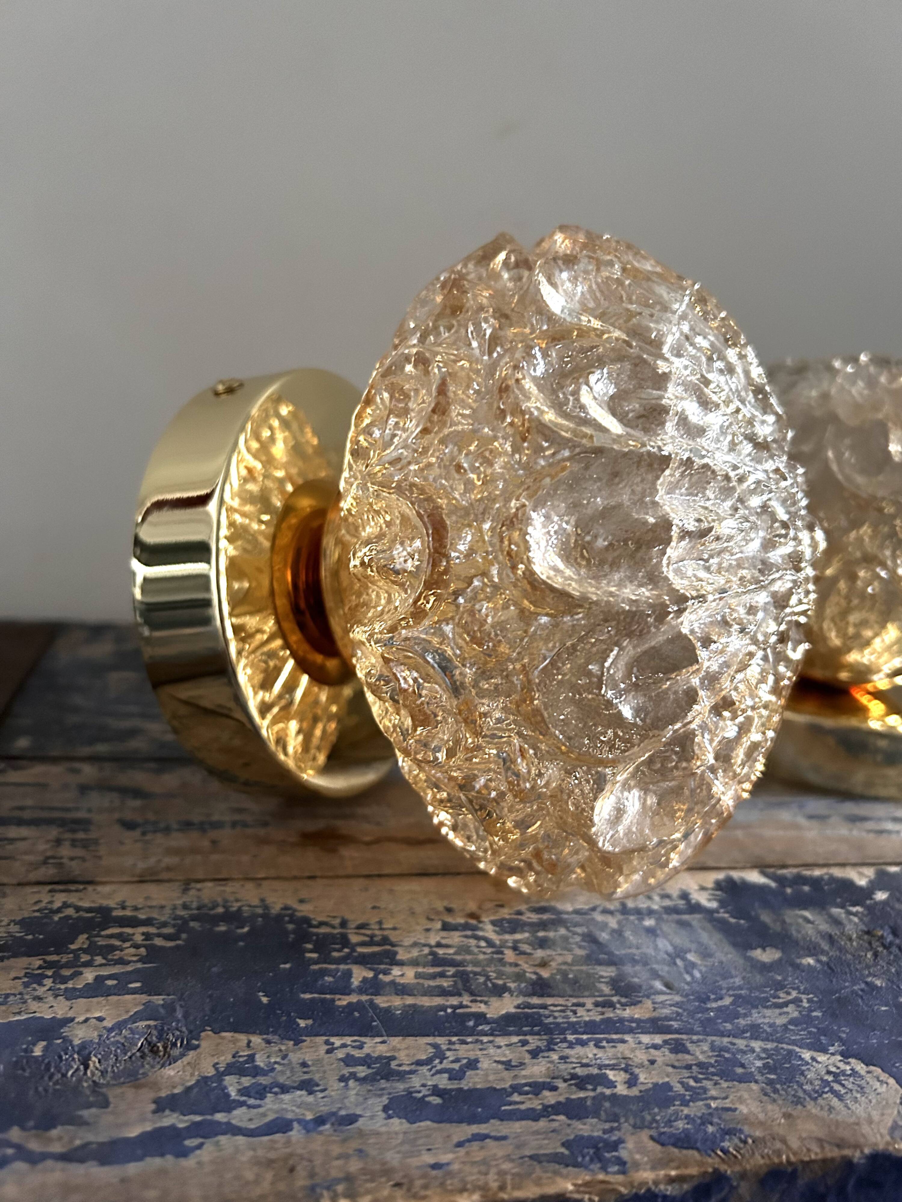 Set of two vintage amber glass wall lights