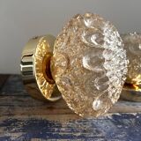 Set of two vintage amber glass wall lights