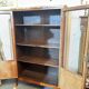 Directoire style display cabinet with two doors