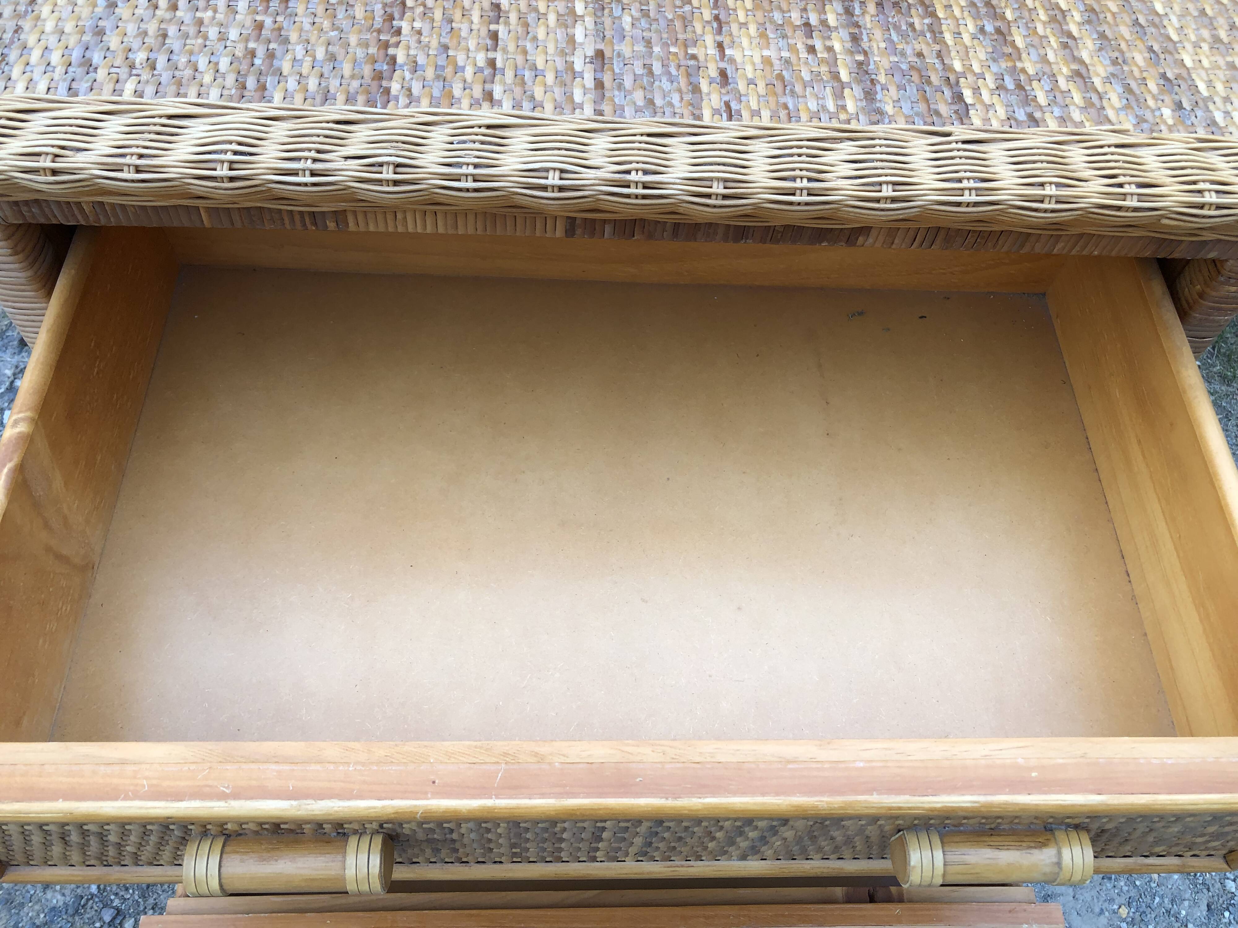 Vintage rattan chest of drawers has 3 drawers.