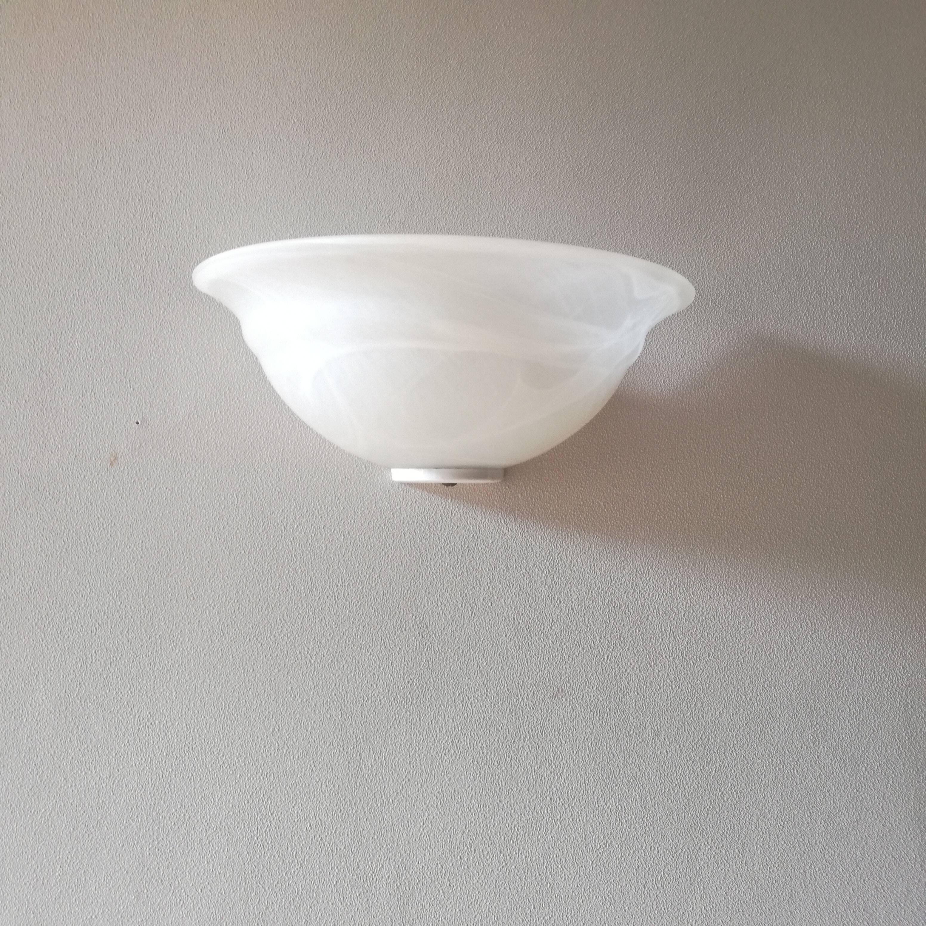 Half bell wall light in milky glass