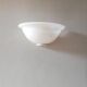 Half bell wall light in milky glass
