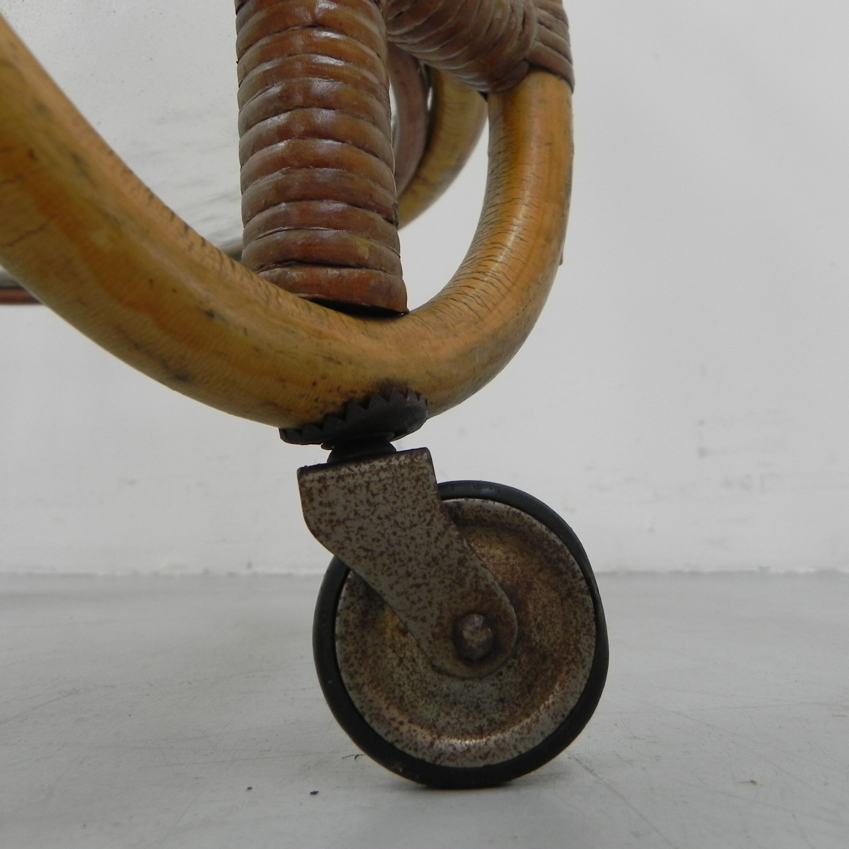 Bamboo, rattan serving trolley on castors