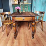 Antique farmhouse table and bistro chairs
