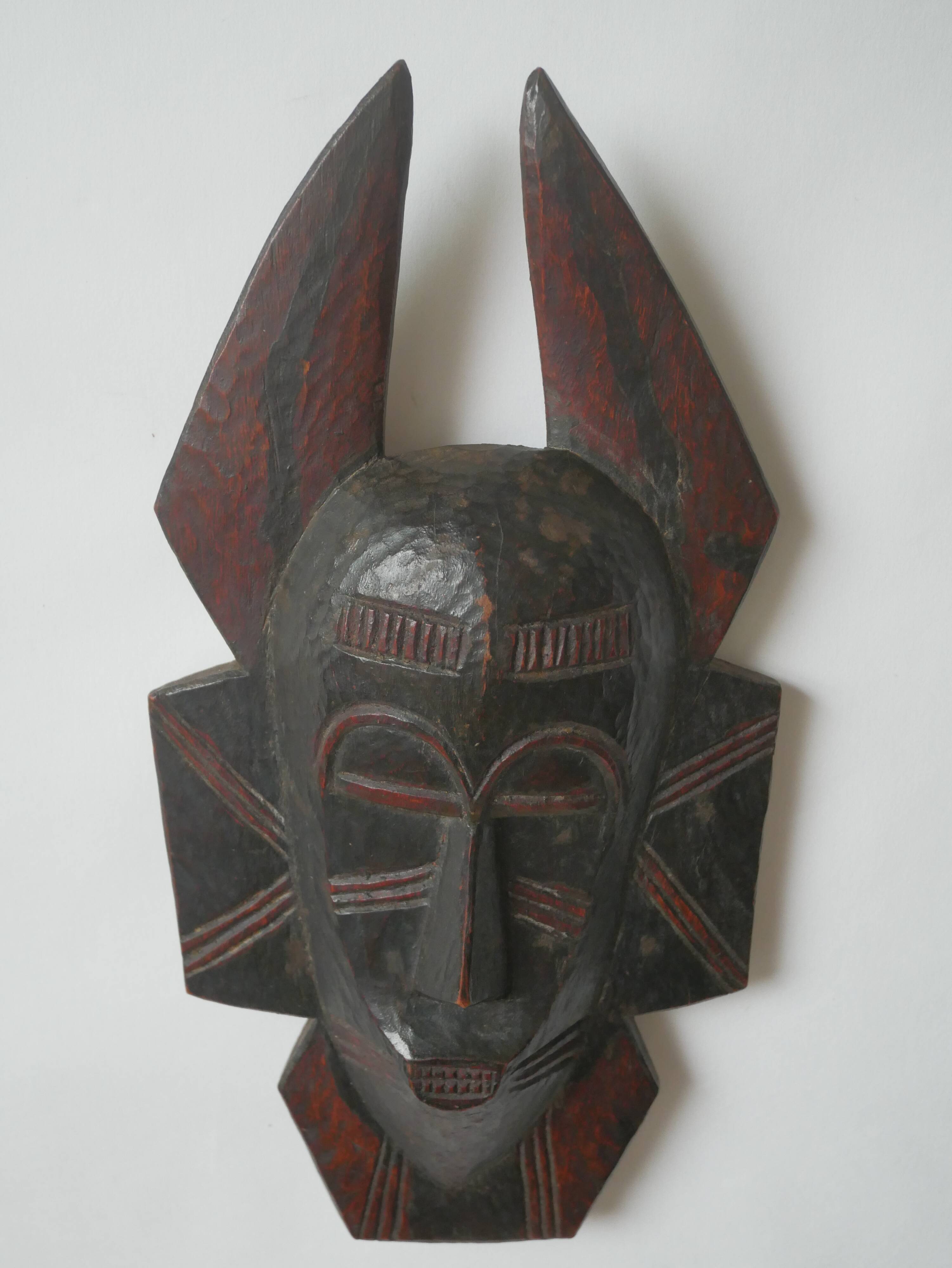 Carved wooden mask African art tribal decoration