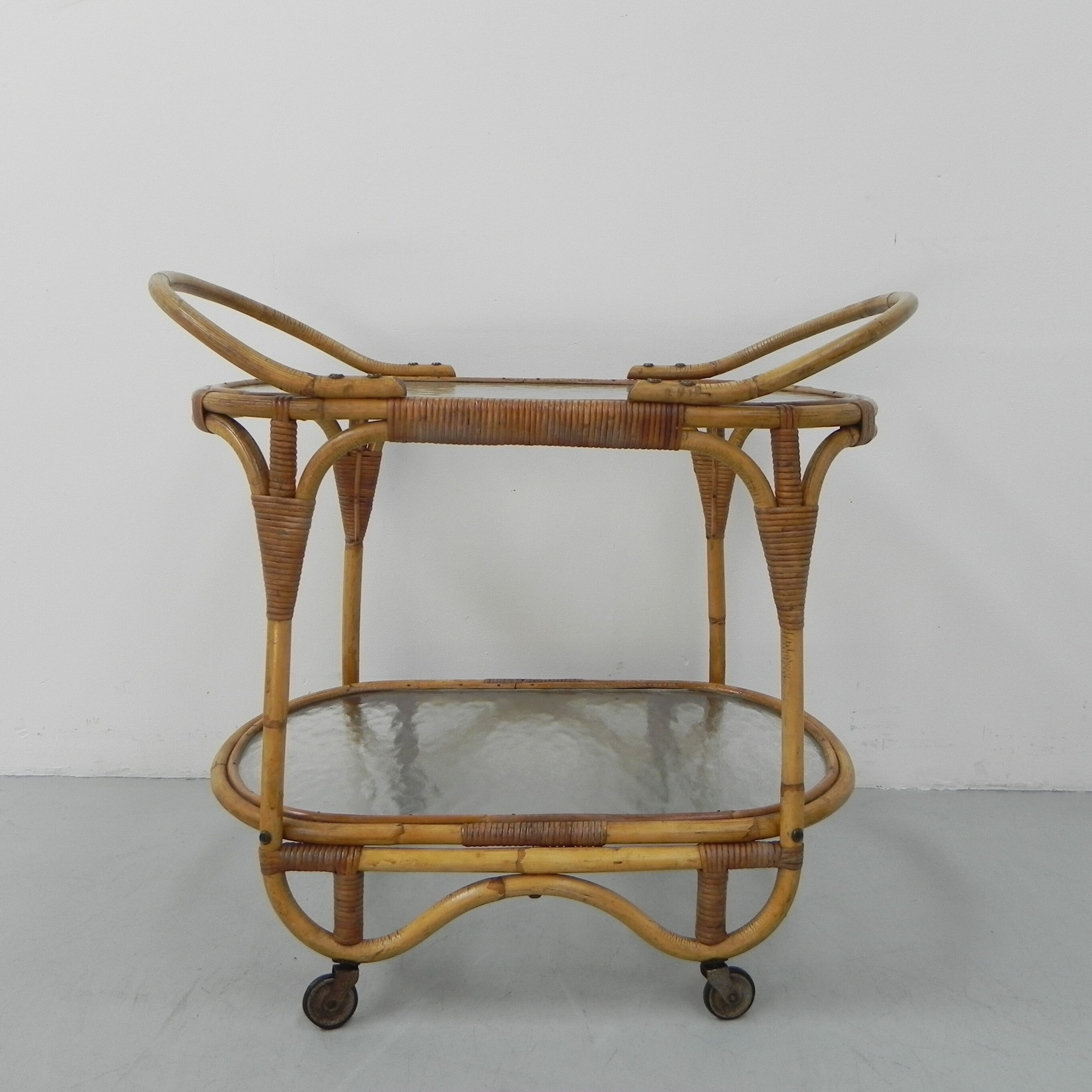 Bamboo, rattan serving trolley on castors