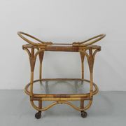 Bamboo, rattan serving trolley on castors