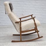 1970s, Danish rocking chair, reupholstered in quality genuine sheepskin.
