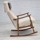 1970s, Danish rocking chair, reupholstered in quality genuine sheepskin.