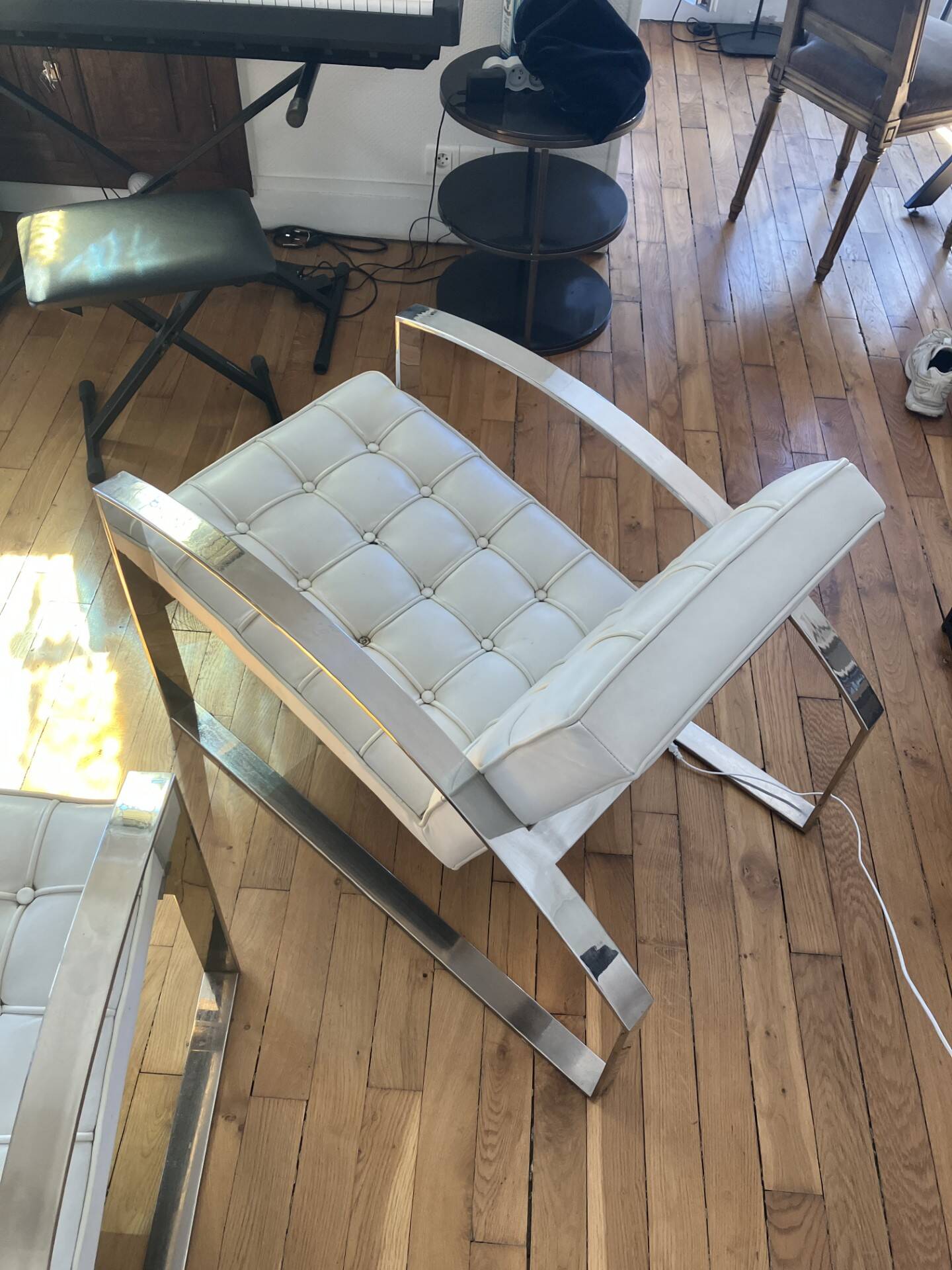 Meridiani armchair — italian design, chrome steel and tufted white leather.