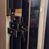 Black and gold lacquered Sanibloc furniture in the style of Maison Jansen, 1970