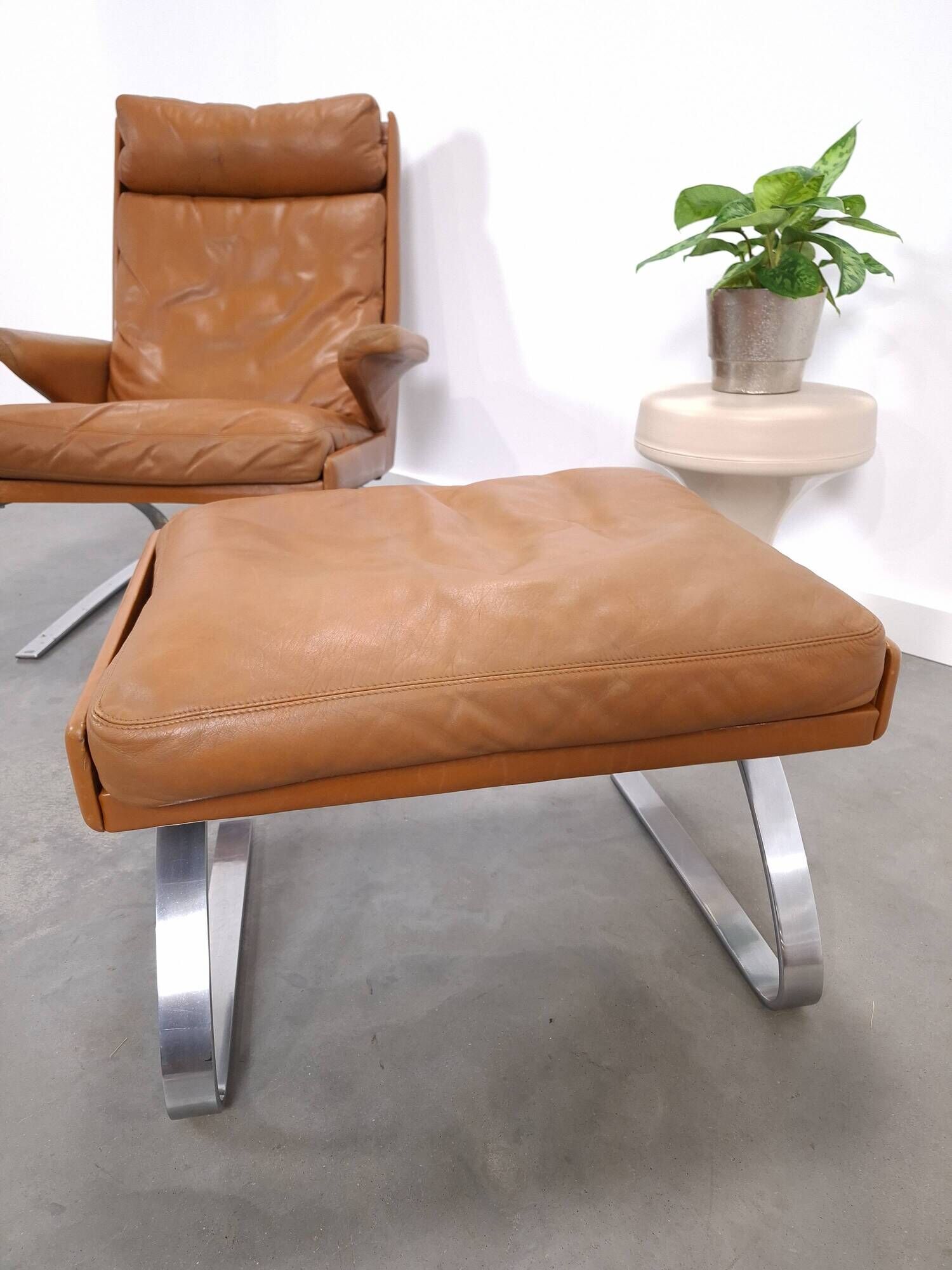 Vintage COR Swing armchair with ottoman, Reinhold Adolf, cognac leather